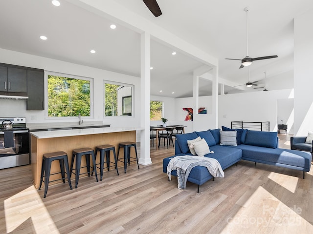 85 S Fork Trl, Lake Toxaway, NC 28747 - living room with ceiling fan, light wood-type flooring, recessed lighting, and lofted ceiling