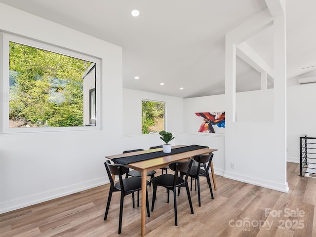 85 S Fork Trl, Lake Toxaway, NC 28747 - dining space with light wood-type flooring, baseboards, recessed lighting, and a wall mounted air conditioner