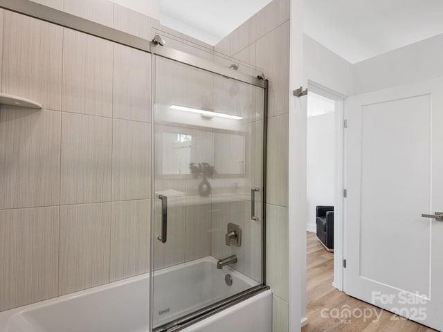 85 S Fork Trl, Lake Toxaway, NC 28747 - full bathroom featuring enclosed tub / shower combo and wood finished floors