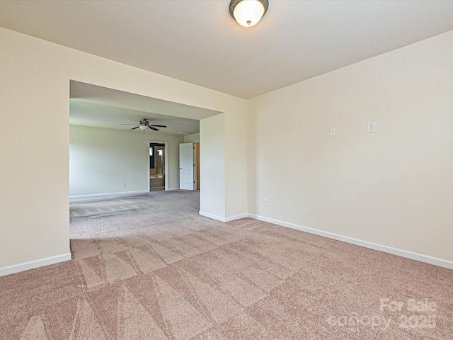 9027 Gray Willow Rd, Charlotte, NC 28227 - carpeted spare room featuring baseboards and a ceiling fan