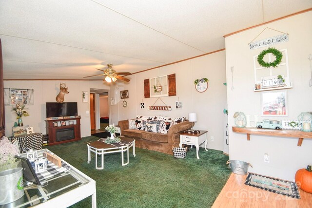 1574 Burke Duncan Rd, Lancaster, SC 29720 - carpeted living area featuring a ceiling fan, ornamental molding, and a fireplace