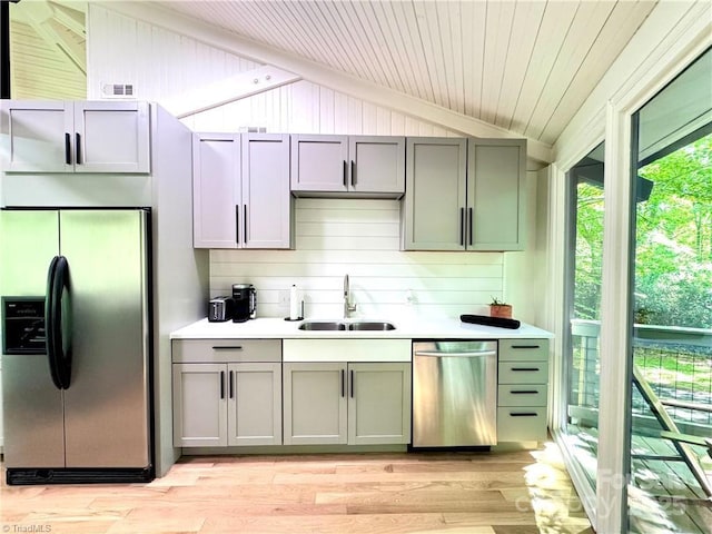 164 Johnson Ridge Rd, Elkin, NC 28621 - kitchen featuring appliances with stainless steel finishes, lofted ceiling, a sink, light countertops, and light wood-type flooring