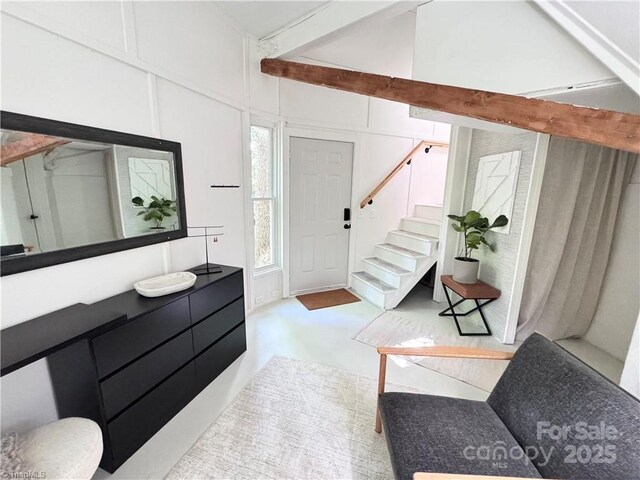 164 Johnson Ridge Rd, Elkin, NC 28621 - entrance foyer featuring stairway and a decorative wall