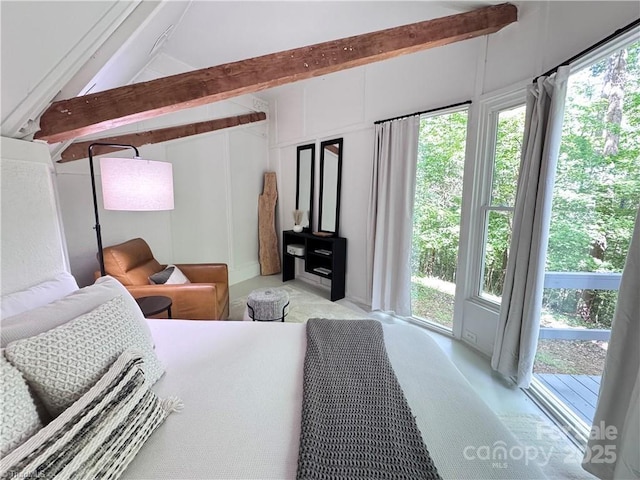 164 Johnson Ridge Rd, Elkin, NC 28621 - bedroom with multiple windows and light carpet