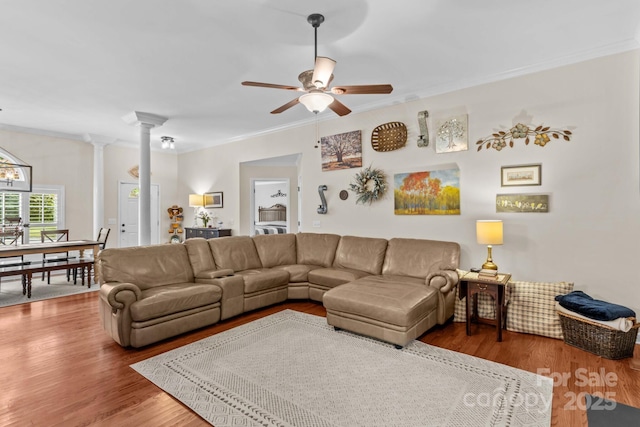149 Harbor Landing Dr, Mooresville, NC 28117 - living area with decorative columns, crown molding, a ceiling fan, and wood finished floors