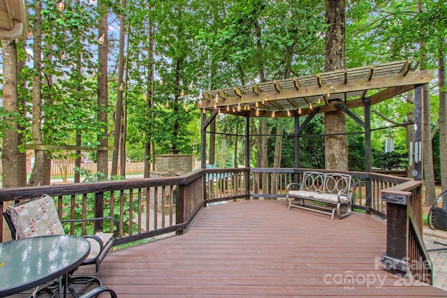 149 Harbor Landing Dr, Mooresville, NC 28117 - wooden deck with a pergola and view of wooded area