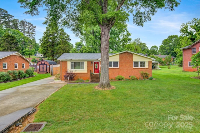 1405 8th Ave NW, Conover, NC 28613 - ranch-style home with a storage shed, concrete driveway, brick siding, an outdoor structure, and a front yard