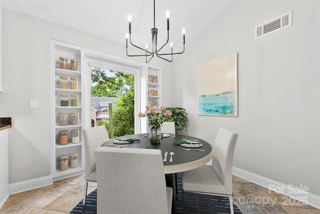 430 Queens Rd Unit 332, Charlotte, NC 28207 - dining space with a chandelier and baseboards