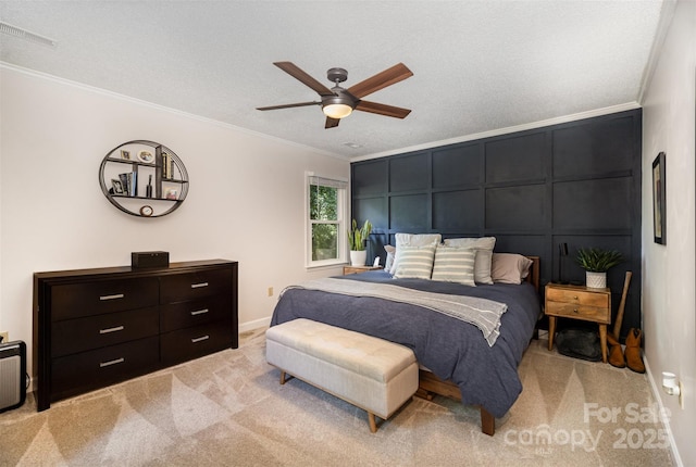 1014 Covewood Ct, Charlotte, NC 28270 - bedroom with crown molding, light colored carpet, a decorative wall, a ceiling fan, and baseboards