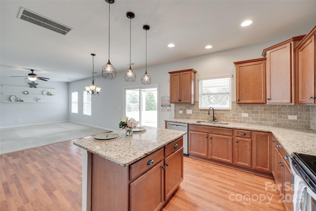 1412 Afternoon Sun Rd, Matthews, NC 28104 - kitchen with stainless steel dishwasher, brown cabinetry, decorative backsplash, open floor plan, and light stone counters