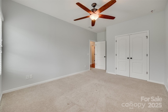 1412 Afternoon Sun Rd, Matthews, NC 28104 - unfurnished bedroom featuring carpet, a closet, and a ceiling fan