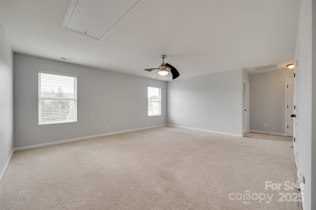 1412 Afternoon Sun Rd, Matthews, NC 28104 - empty room featuring attic access, light colored carpet, and ceiling fan