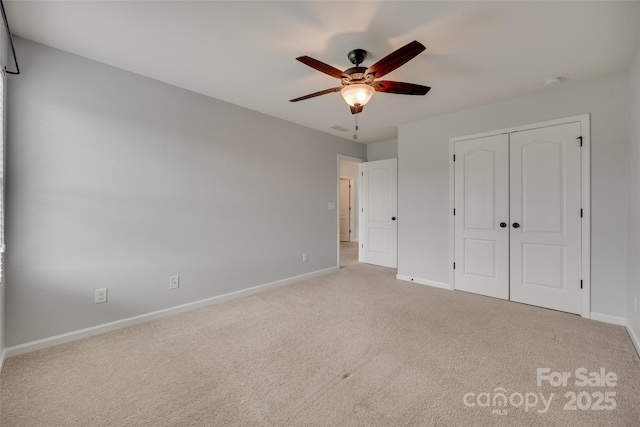 1412 Afternoon Sun Rd, Matthews, NC 28104 - unfurnished bedroom featuring carpet floors, a closet, and a ceiling fan