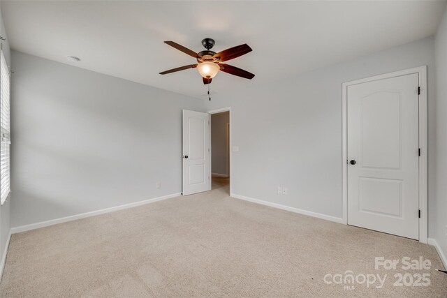 1412 Afternoon Sun Rd, Matthews, NC 28104 - unfurnished bedroom featuring carpet flooring and a ceiling fan
