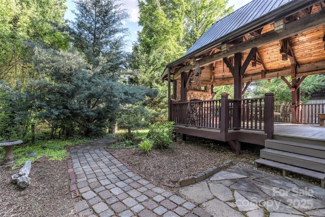 view of yard featuring a gazebo and a deck