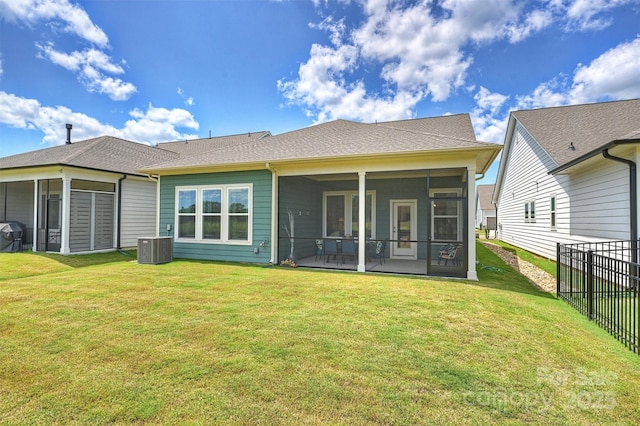 1133 Idyllic Ln, Waxhaw, NC 28173 - back of house featuring a sunroom, cooling unit, and roof with shingles