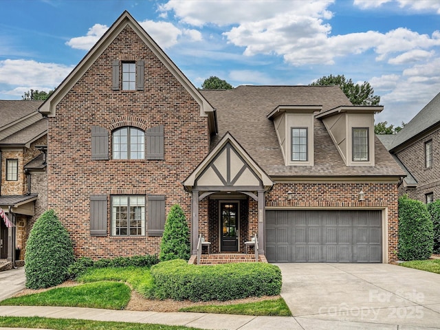 6128 Fletcher Cir, Charlotte, NC 28226 - view of front of house featuring brick siding, concrete driveway, a shingled roof, and an attached garage