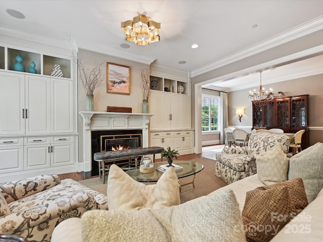 6128 Fletcher Cir, Charlotte, NC 28226 - living room with a chandelier, ornamental molding, a glass covered fireplace, and light carpet