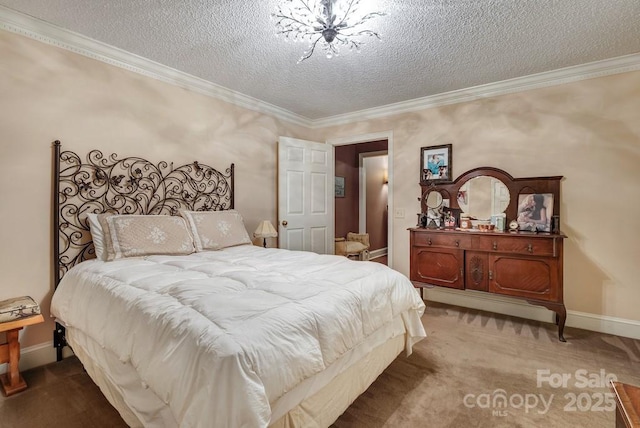 carpeted bedroom with a textured ceiling, ornamental molding, and baseboards