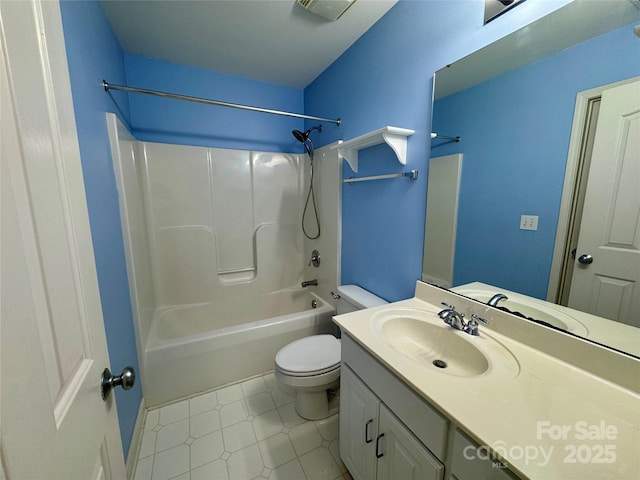 full bath with toilet, vanity, and  shower combination