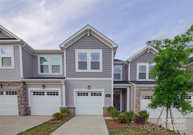 14806 Tamarack Dr, Charlotte, NC 28278 - multi unit property with stone siding, an attached garage, and driveway