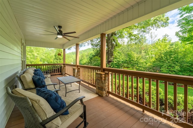 3407 Patton Rd, Franklin, NC 28734 - wooden terrace featuring a ceiling fan and an outdoor living space