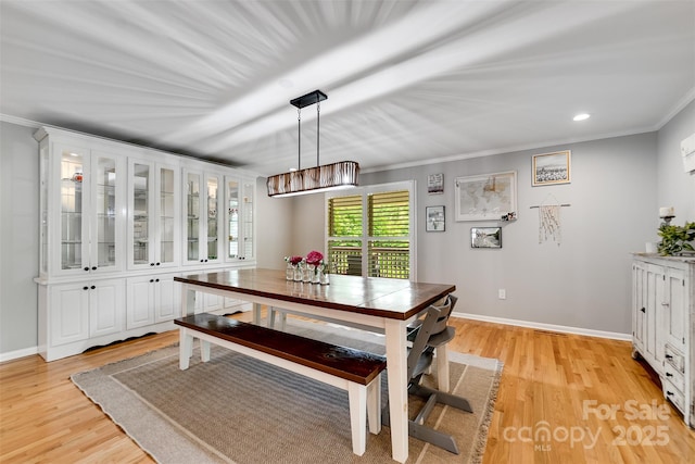 3407 Patton Rd, Franklin, NC 28734 - dining area with crown molding, light wood-style floors, baseboards, and recessed lighting