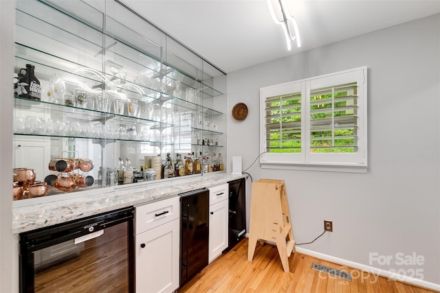 3407 Patton Rd, Franklin, NC 28734 - indoor bar with wine cooler and light wood-style flooring