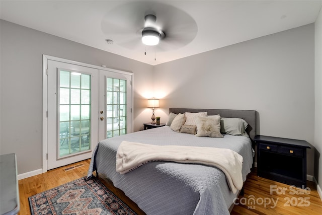 3407 Patton Rd, Franklin, NC 28734 - bedroom featuring french doors, access to outside, light wood finished floors, baseboards, and ceiling fan