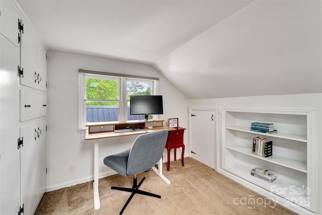 3407 Patton Rd, Franklin, NC 28734 - home office featuring light colored carpet, vaulted ceiling, and baseboards