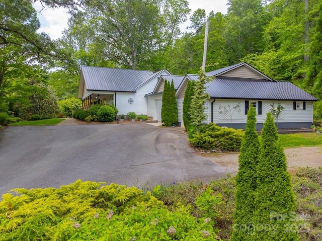 3407 Patton Rd, Franklin, NC 28734 - view of front of home featuring metal roof and asphalt driveway