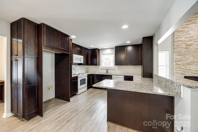 752 Chipmeadow Ln, York, SC 29745 - kitchen with white appliances, a sink, a peninsula, healthy amount of natural light, and recessed lighting