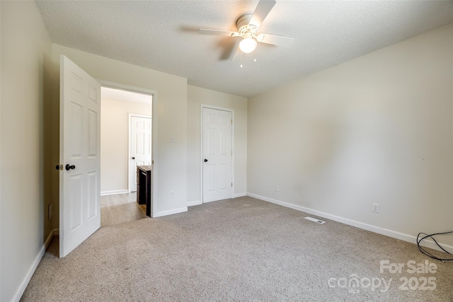 752 Chipmeadow Ln, York, SC 29745 - unfurnished bedroom with carpet floors, baseboards, a ceiling fan, and a textured ceiling