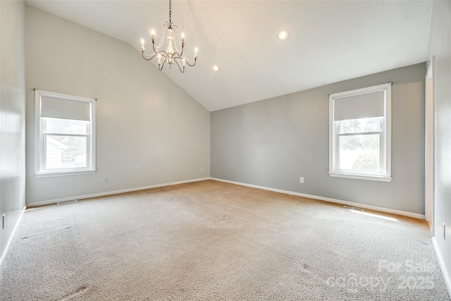 752 Chipmeadow Ln, York, SC 29745 - empty room with vaulted ceiling, carpet flooring, a chandelier, and baseboards