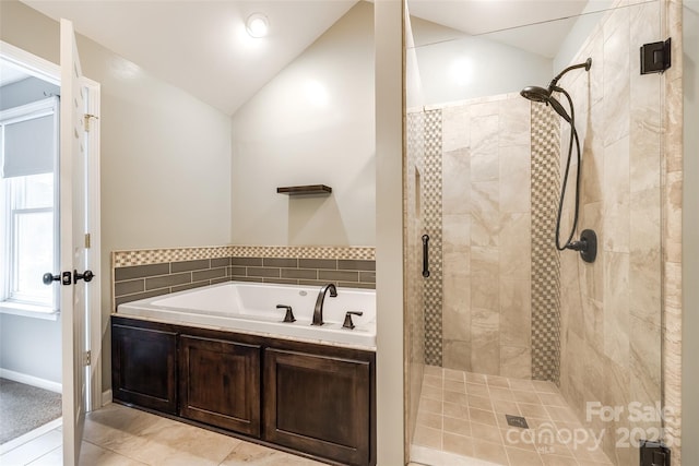 752 Chipmeadow Ln, York, SC 29745 - bathroom featuring a shower stall, a garden tub, and lofted ceiling