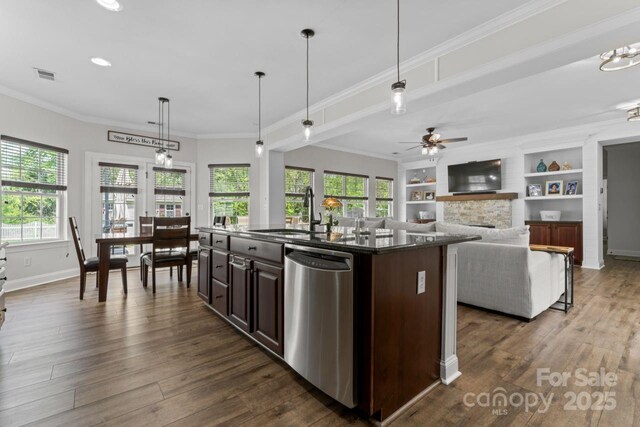 1016 Spanish Moss Rd, Indian Trail, NC 28079 - kitchen with a sink, dishwasher, dark brown cabinetry, dark wood-style flooring, and crown molding
