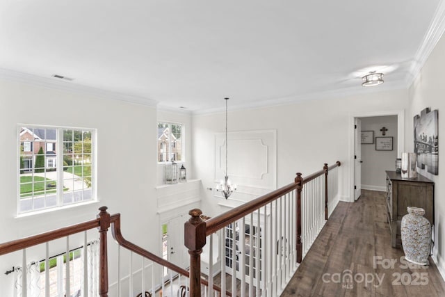 1016 Spanish Moss Rd, Indian Trail, NC 28079 - corridor with an upstairs landing, a chandelier, wood finished floors, ornamental molding, and baseboards
