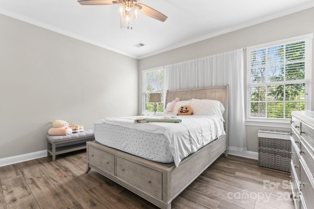 1016 Spanish Moss Rd, Indian Trail, NC 28079 - bedroom with baseboards, wood finished floors, ornamental molding, and a ceiling fan