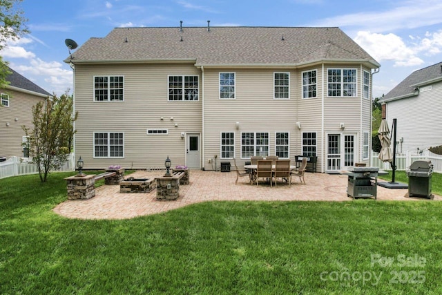 1016 Spanish Moss Rd, Indian Trail, NC 28079 - back of property with a patio area and an outdoor fire pit