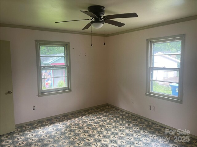 1418 Old Wilkesboro Rd, Salisbury, NC 28144 - empty room with healthy amount of natural light, ceiling fan, and baseboards