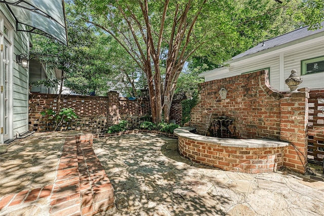 view of patio with fence