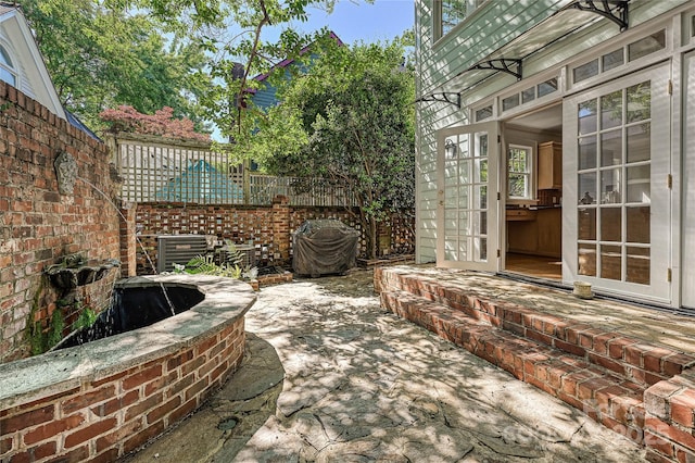 view of patio with fence