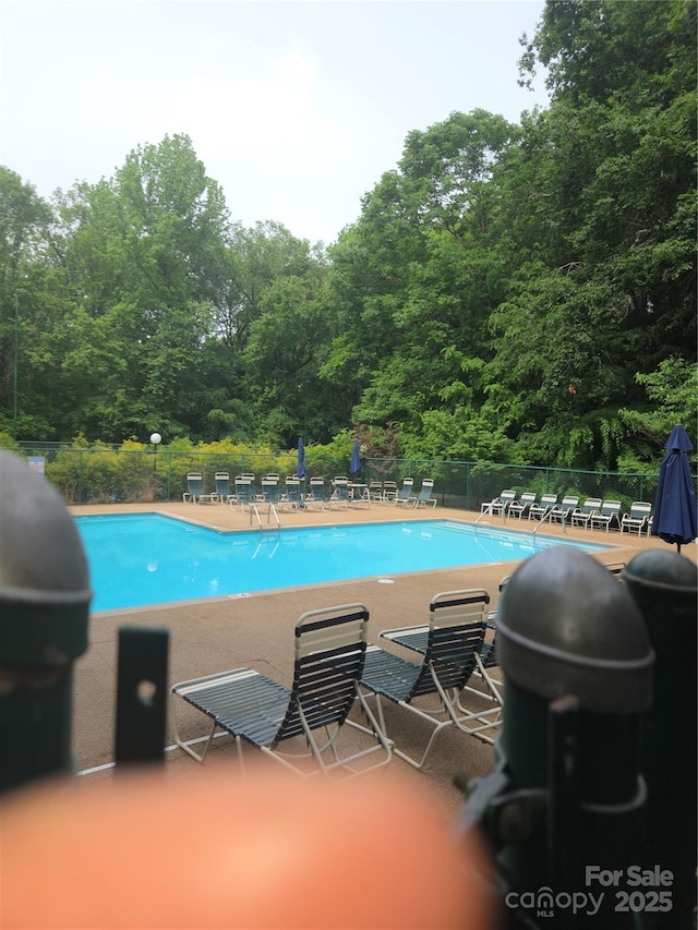 1253 Iverleigh Trl, Charlotte, NC 28270 - community pool featuring fence and a patio
