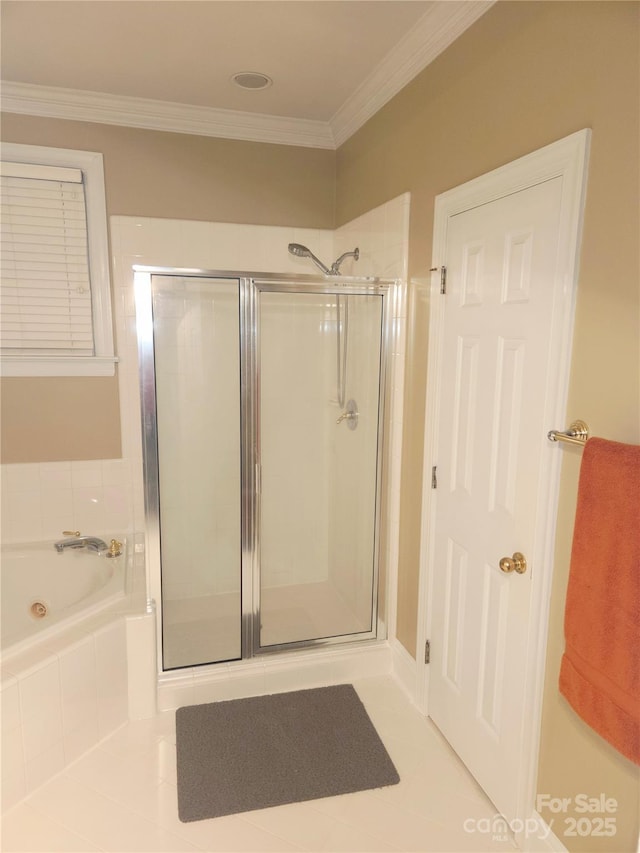 1253 Iverleigh Trl, Charlotte, NC 28270 - full bathroom featuring a stall shower, a bath, ornamental molding, and tile patterned flooring