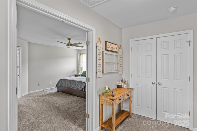176 Pleasant Grove Ln, Mooresville, NC 28115 - bedroom with carpet flooring, baseboards, and a ceiling fan