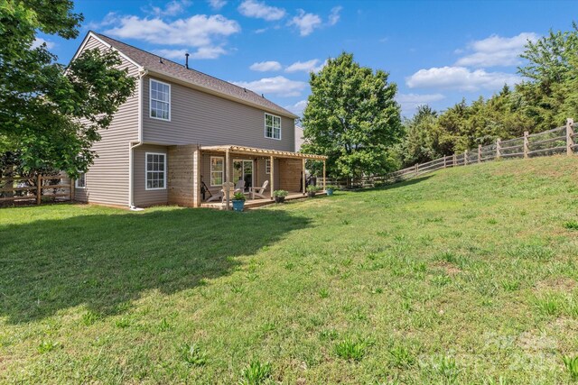 176 Pleasant Grove Ln, Mooresville, NC 28115 - back of property with a patio area and a pergola