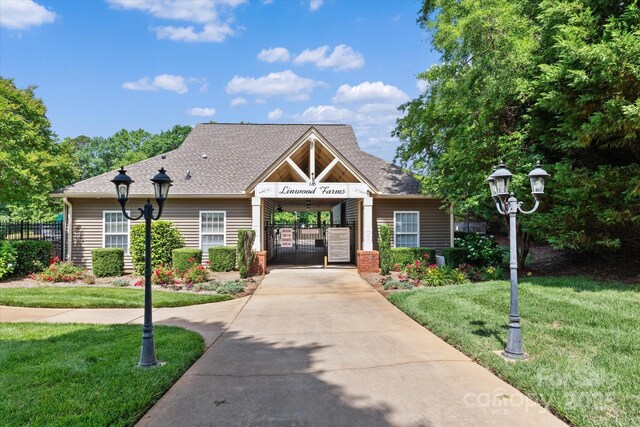 176 Pleasant Grove Ln, Mooresville, NC 28115 - view of property featuring fence and concrete driveway