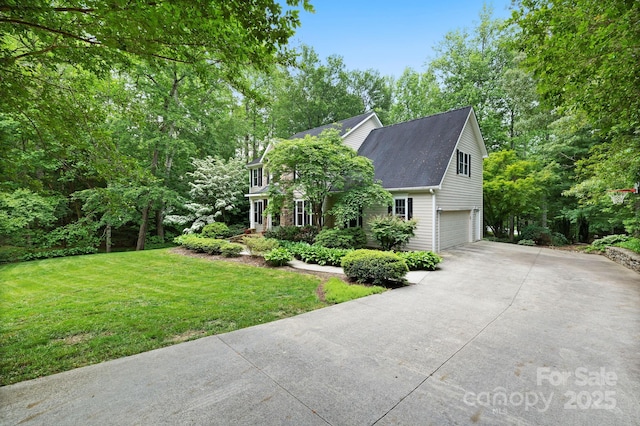 226 Duncan Estate Dr, Fletcher, NC 28732 - view of front of property featuring concrete driveway, an attached garage, a front yard, and a shingled roof