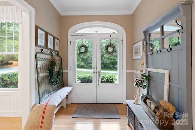 226 Duncan Estate Dr, Fletcher, NC 28732 - foyer entrance featuring french doors, light wood-style flooring, and ornamental molding