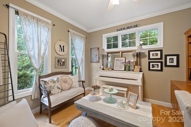 226 Duncan Estate Dr, Fletcher, NC 28732 - sitting room featuring crown molding, wood finished floors, baseboards, and ceiling fan